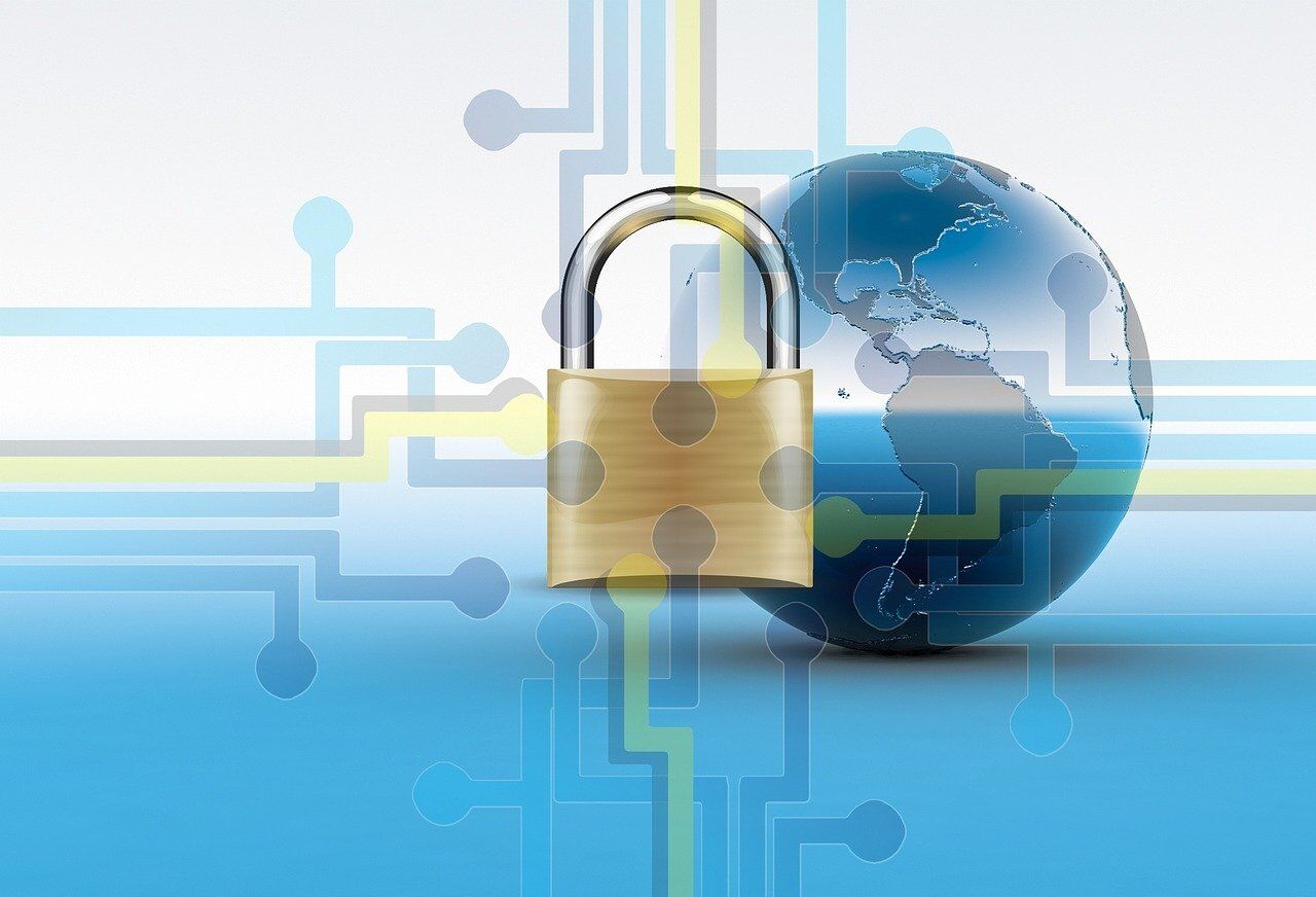 This image highlights a cybersecurity theme, showcasing a lock overlaid on a globe with digital circuits emanating from it.